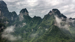 Clouds And Mountain Macbook Wallpaper