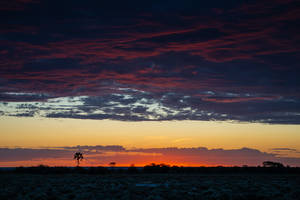 Cloudy Sunset In Namibia Wallpaper