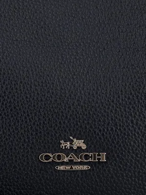 Coach Logo On Black Leather Wallpaper
