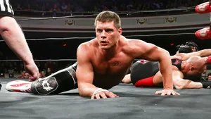 Cody Rhodes - A Championship Wrestler In Action Wallpaper