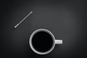 Coffee And Pencil On Black Tablet Wallpaper