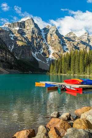 Colorful Boat On Moraine Lake Wallpaper