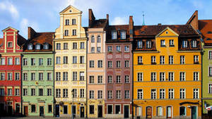 Colorful Buildings Around Market Square In Krakow Poland Wallpaper