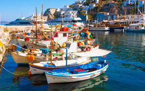 Colorful Fishing Boat In The Harbor Wallpaper