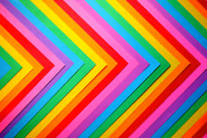Colorful Paper Background With A Rainbow Arrow Wallpaper