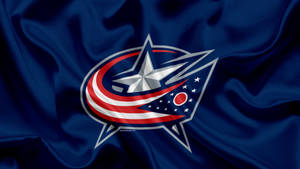 Columbus Blue Jackets Logo On Cloth Wallpaper