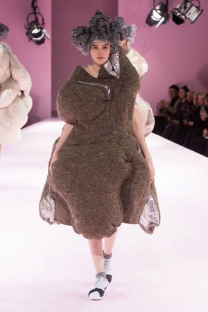 Comme Des Garçons Huge Brown Coat Wallpaper