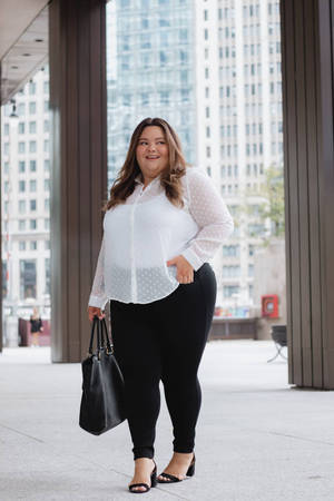 Confident Plus-size Businesswoman Wallpaper