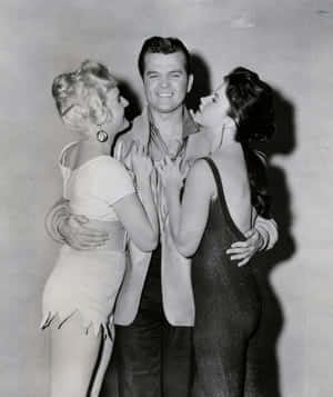 Conway_ Twitty_with_ Two_ Women_ Vintage_ Photo Wallpaper