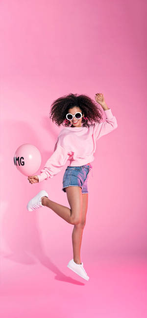 Cool Girl Jumping In Pink Wallpaper