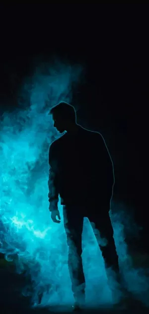 Cool Guy Silhouette Against Smoke Wallpaper
