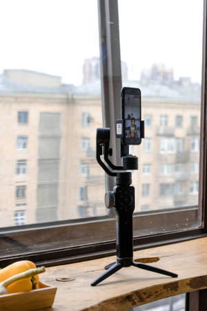 Cool Iphone On Tripod Wallpaper