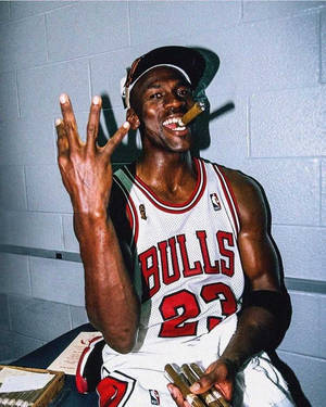 Cool Michael Jordan Smoking A Cigar Wallpaper