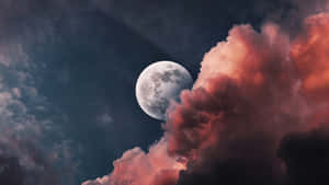 Cool Moon Through Red Clouds Wallpaper