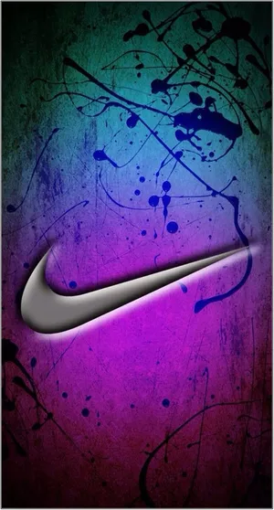 Cool Nike Emblem With Paint Splashes Wallpaper