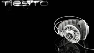 Cool Tiësto Graphic With Headphones Wallpaper