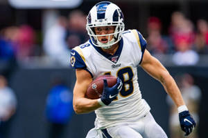 Cooper Kupp Nfl Rams Football Rush Photography Wallpaper