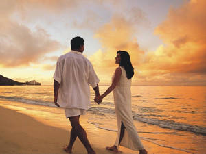 Couple At The Beach Wallpaper