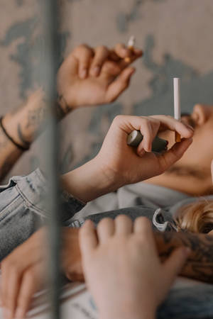 Couple Hands Cigarettes Wallpaper