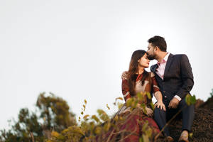 Couple In Love Forehead Kiss Wallpaper