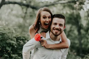Couple Piggyback Ride Wallpaper