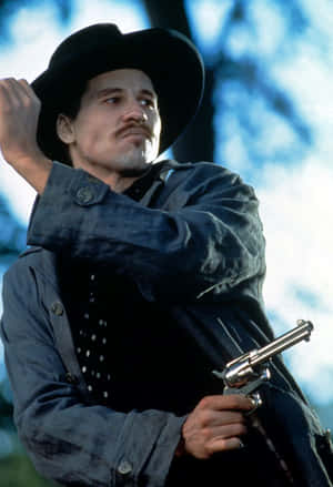 Cowboyin Black Hatwith Revolver Wallpaper