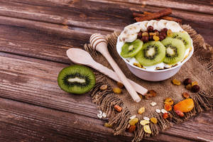 Cozy Kiwi Fruit Bowl Wallpaper