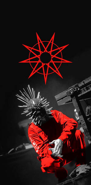 Craig Jones Of Slipknot With Iconic Red Logo Wallpaper