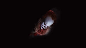 Creepy_ Clown_in_ Darkness Wallpaper