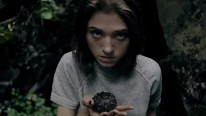 Creepy Image Of Natalia Dyer Wallpaper