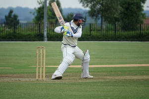 Cricket Batter In White Gear Wallpaper