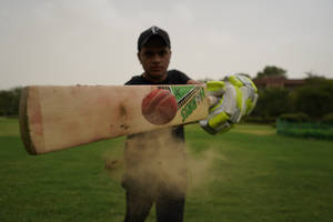 Cricket Man In Black Cap Wallpaper