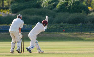 Cricket Red Ball Midair Wallpaper