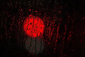 Crimson_ Raindrops_on_ Glass Wallpaper