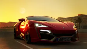 Cruise Down The Highway In A Sleek, Fast Car. Wallpaper