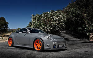 Cruise The Open Roads In The Nissan 350z Wallpaper