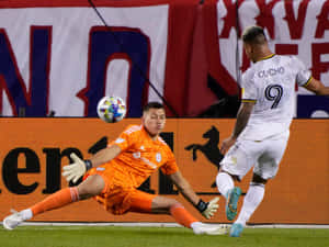 Cucho Hernandez Against Chicago Fire Goalkeeper Wallpaper