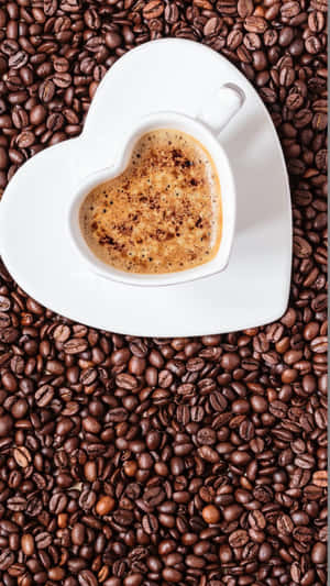 Cup Of Coffee On Heart Saucer Wallpaper