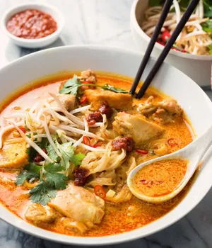 Curry Laksa With Flavorful Orange Soup Wallpaper
