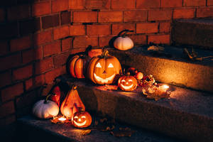 Cute Aesthetic Halloween On Stairs Wallpaper