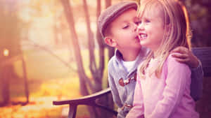 Cute Baby Couple Happy In Love Wallpaper