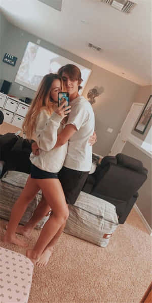 Cute Boyfriend Smiling And Posing Wallpaper