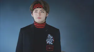 Cute Bts V In Black And Red Wallpaper