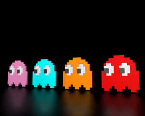 Cute Gaming Pac-man Characters Wallpaper