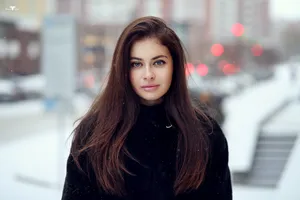 Cute Girl In Black Sweater Jacket Wallpaper