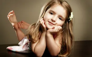 Cute Girl With A Cute Pose Wallpaper