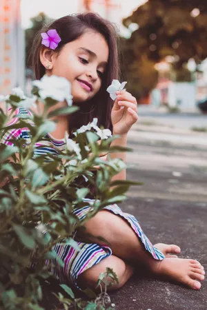 Cute Girl With Purple Flower Wallpaper