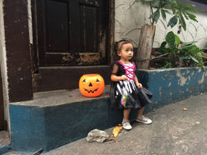 Cute Halloween Little Girl Wallpaper