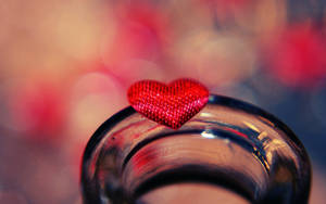 Cute Heart On Mouth Of Bottle Wallpaper