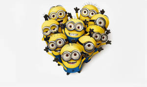 Cute Minions Forming A Heart Wallpaper